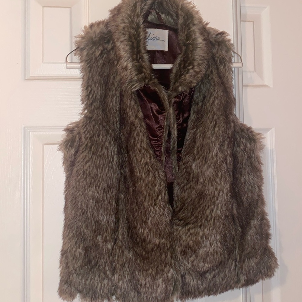 Kina fur vest